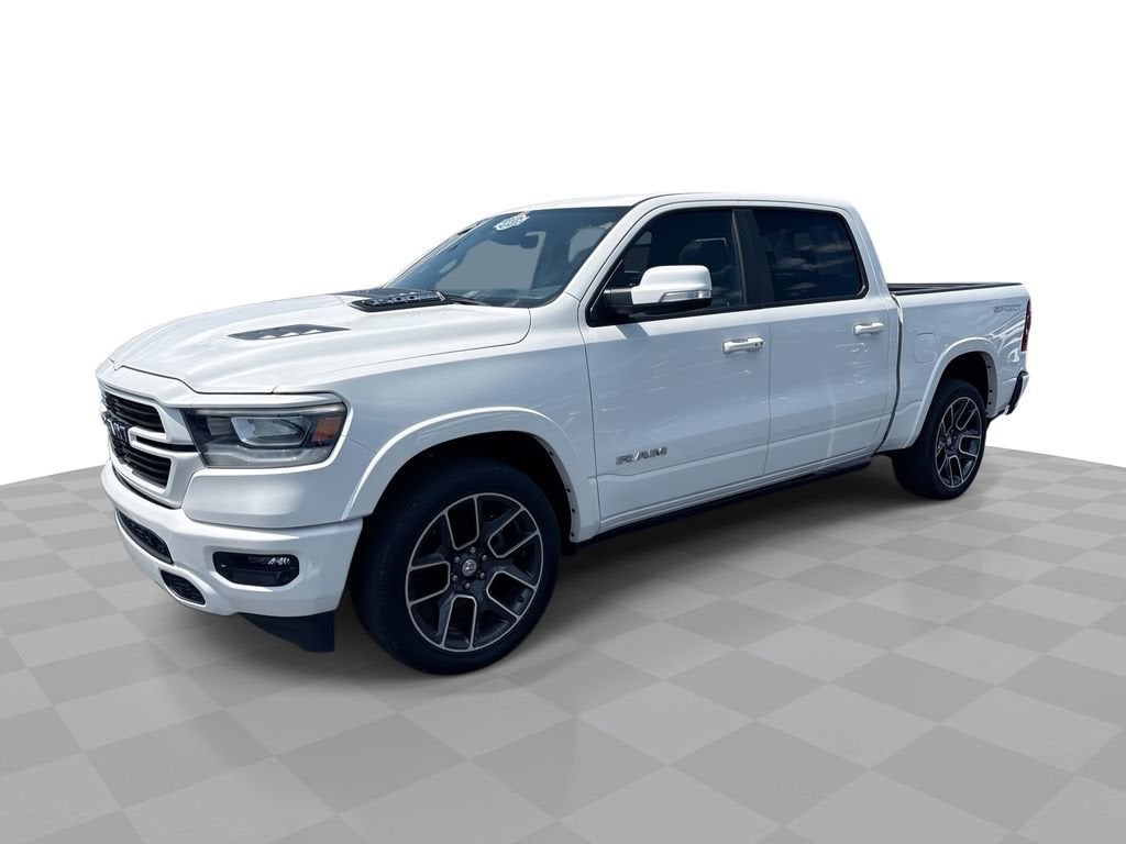2021 RAM 1500 Laramie in Ivory White Tri-C — front three-quarter view