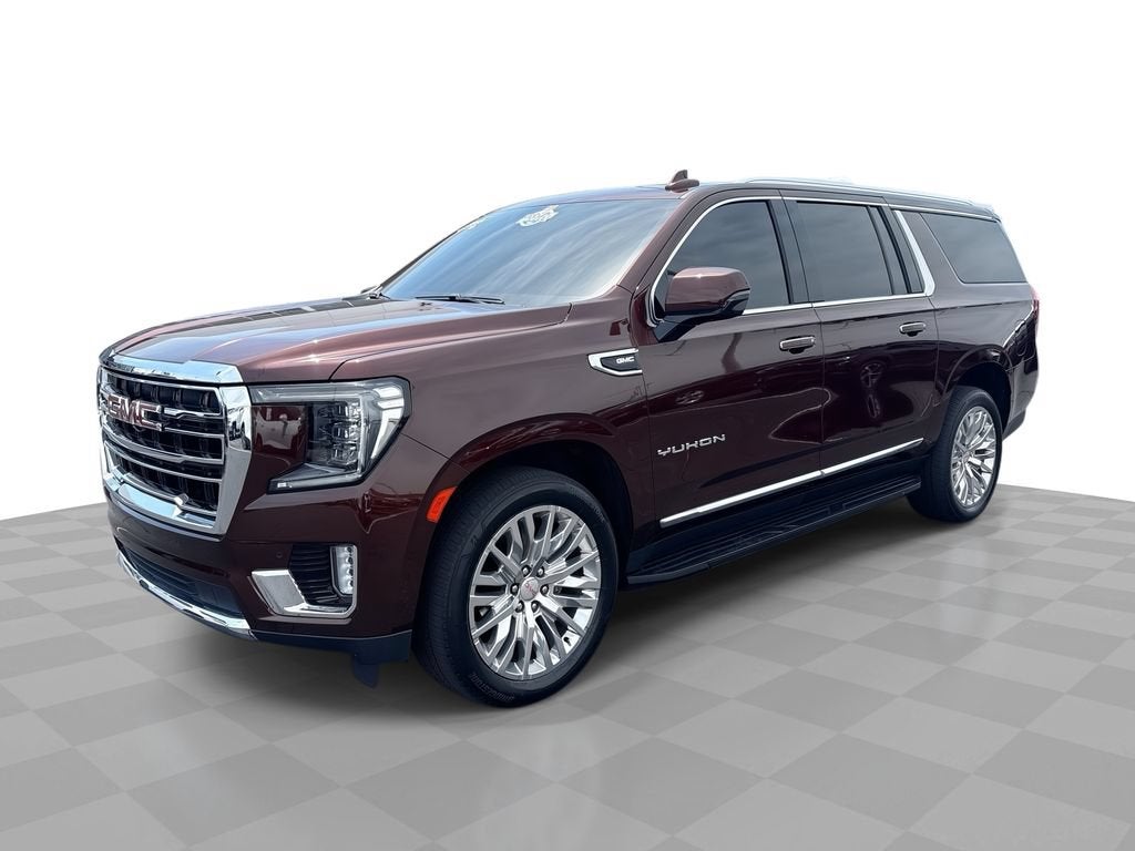 2023 GMC Yukon XL SLT in Redwood Metallic — front three-quarter view