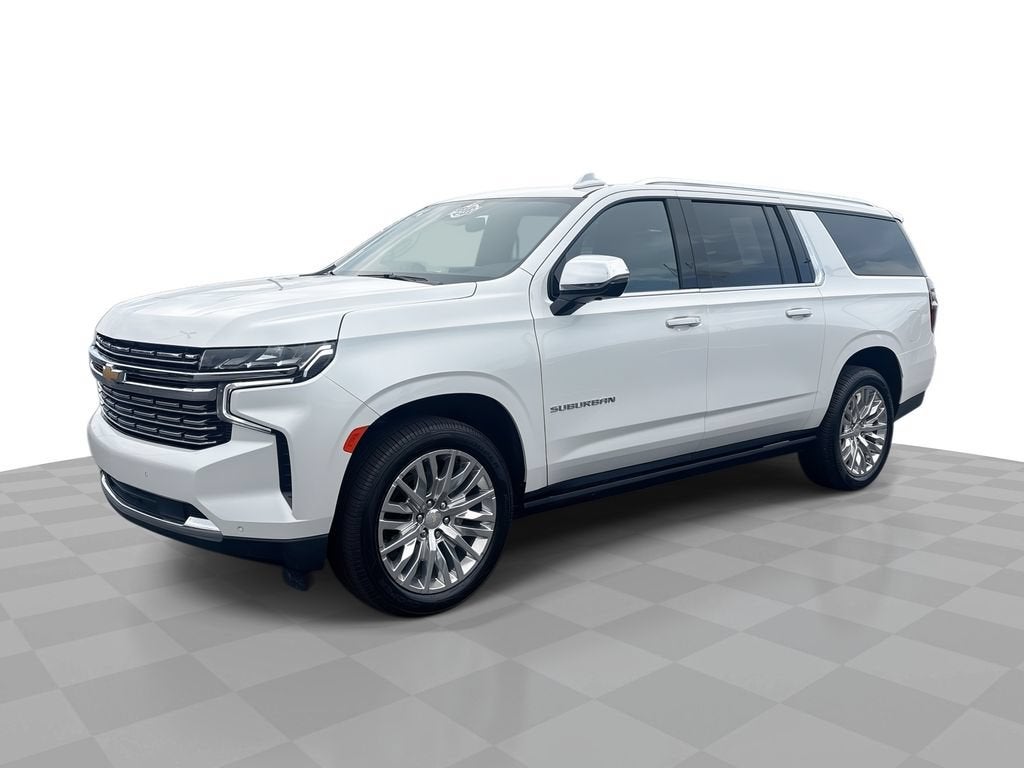 2023 Chevrolet Suburban Premier in Iridescent Pearl Tricoat — front three-quarter view