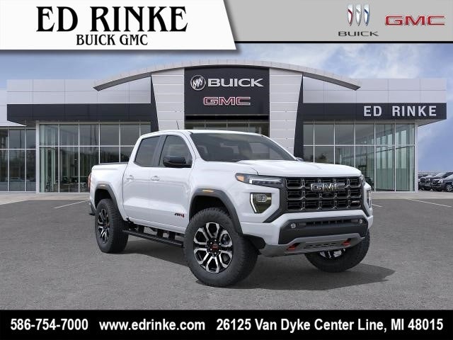 2026 GMC Canyon AT4 in Summit White — front three-quarter view