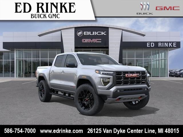 2026 GMC Canyon AT4 in Sterling Metallic — front three-quarter view