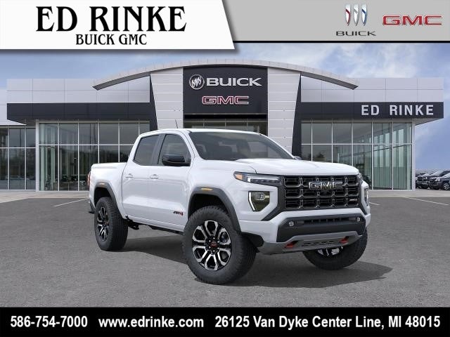 2026 GMC Canyon AT4 in Summit White — front three-quarter view