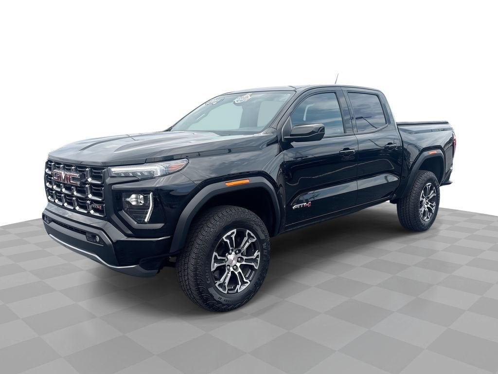 2023 GMC Canyon AT4 in Onyx Black — front three-quarter view