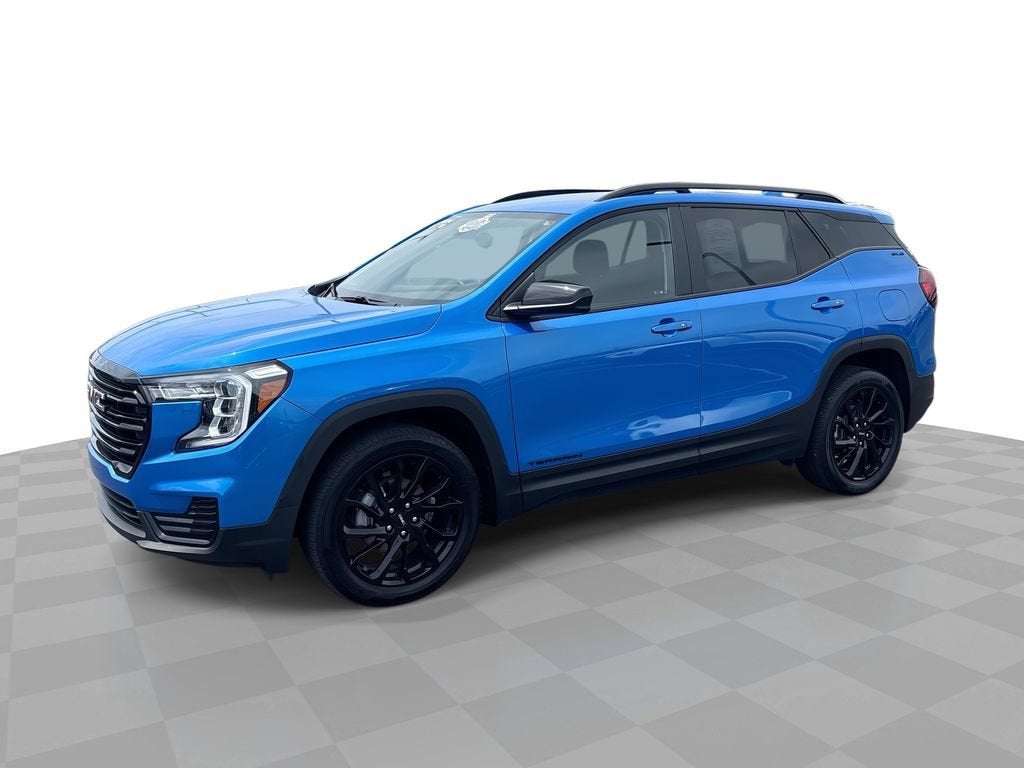 2024 GMC Terrain SLE in Riptide Metallic — front three-quarter view