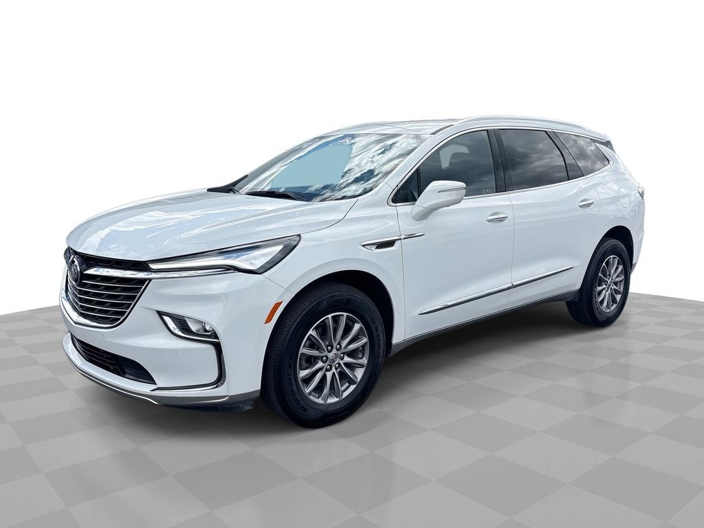 2024 Buick Enclave Essence in Summit White — front three-quarter view
